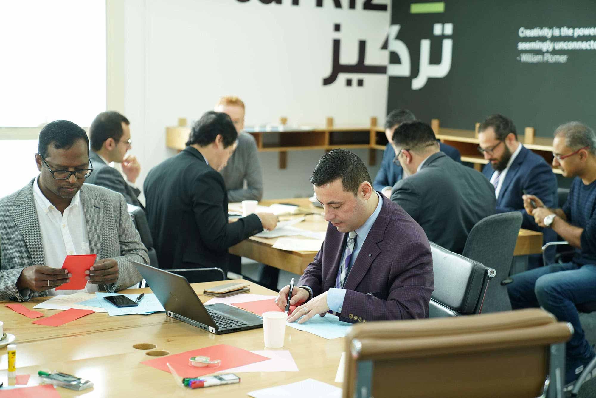 TASMU in Partnership with Gartner Holds A Workshop with Government Stakeholders to Leverage the Power of Artificial Intelligence in Qatar - slide 1